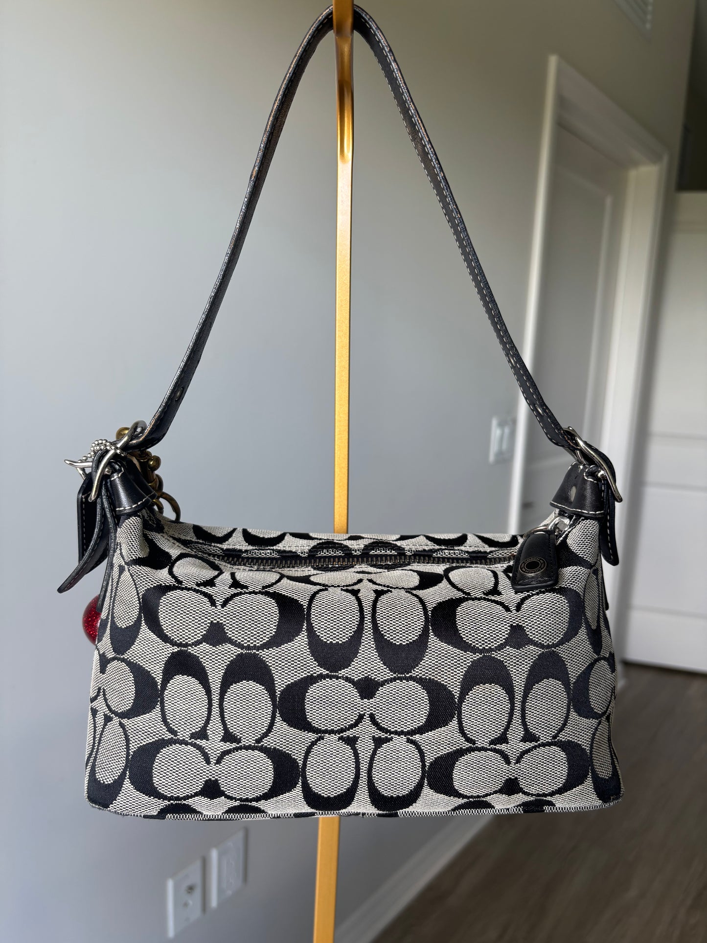 Grey mongram coach small shoulder bag