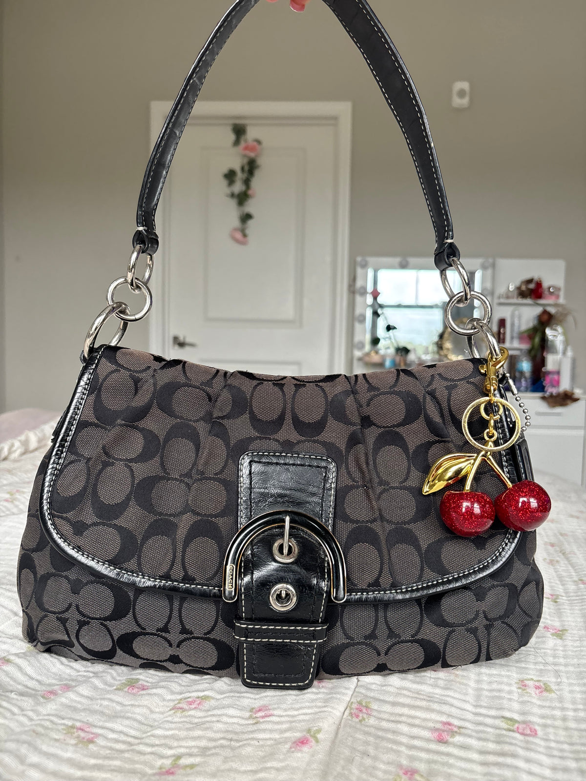 Black mongram coach soho
