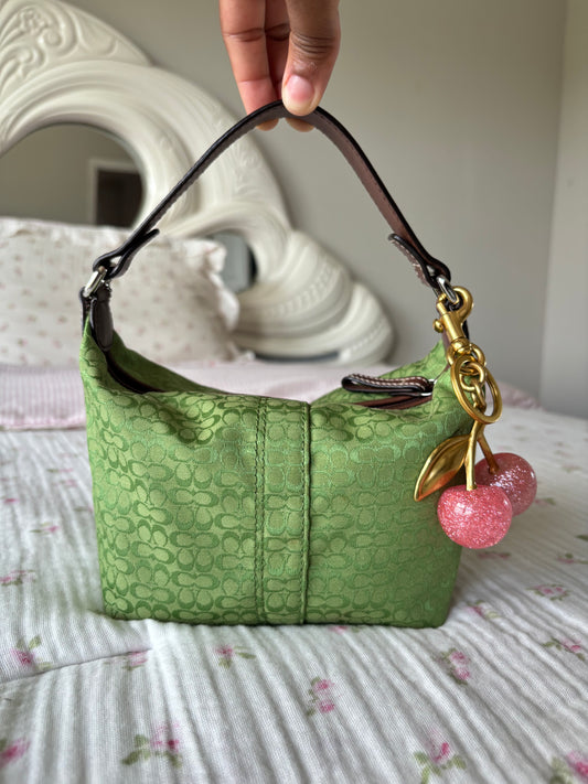 Rare green coach baggutte hand bag