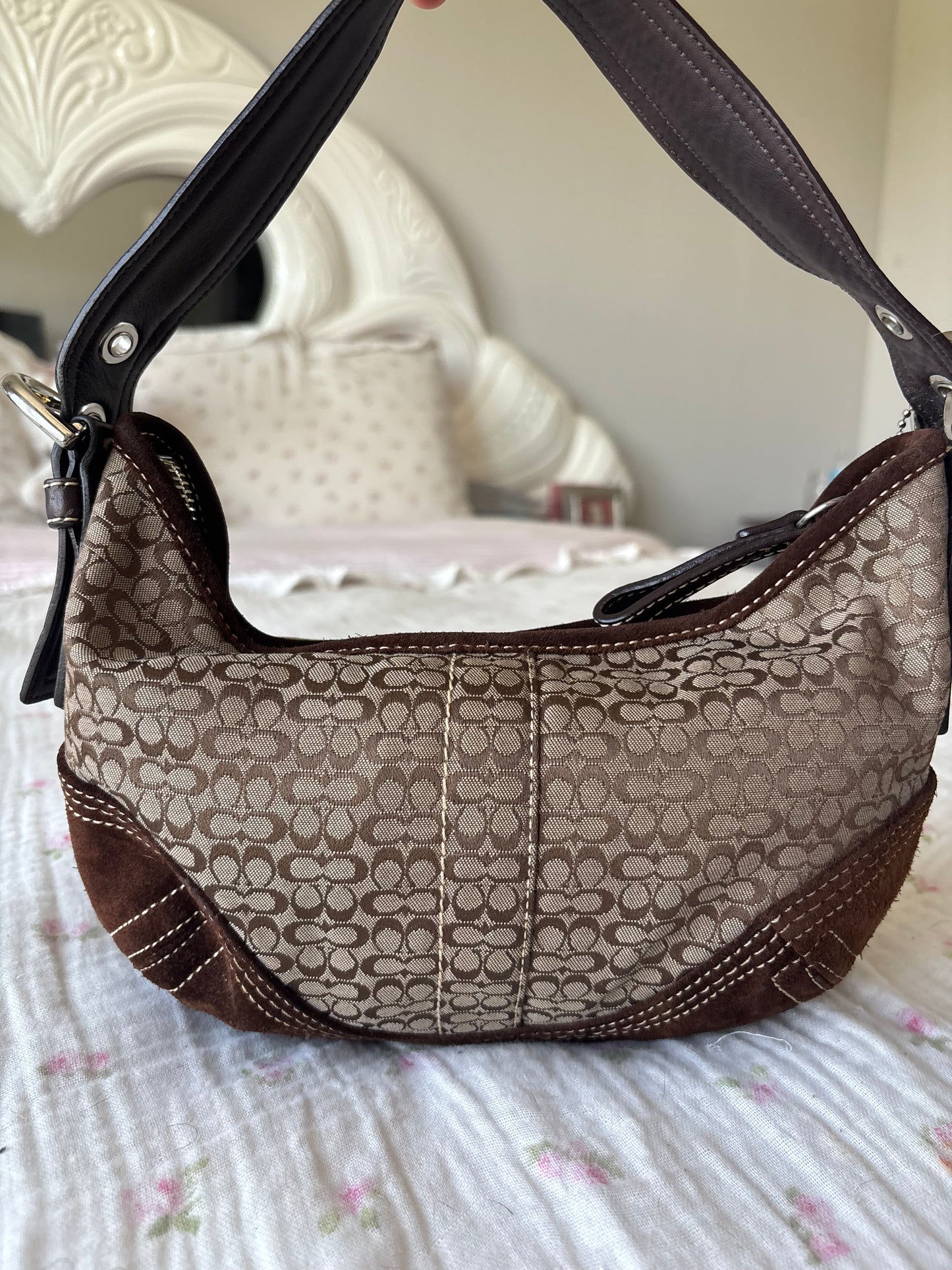 Brown mongram coach hobo bag