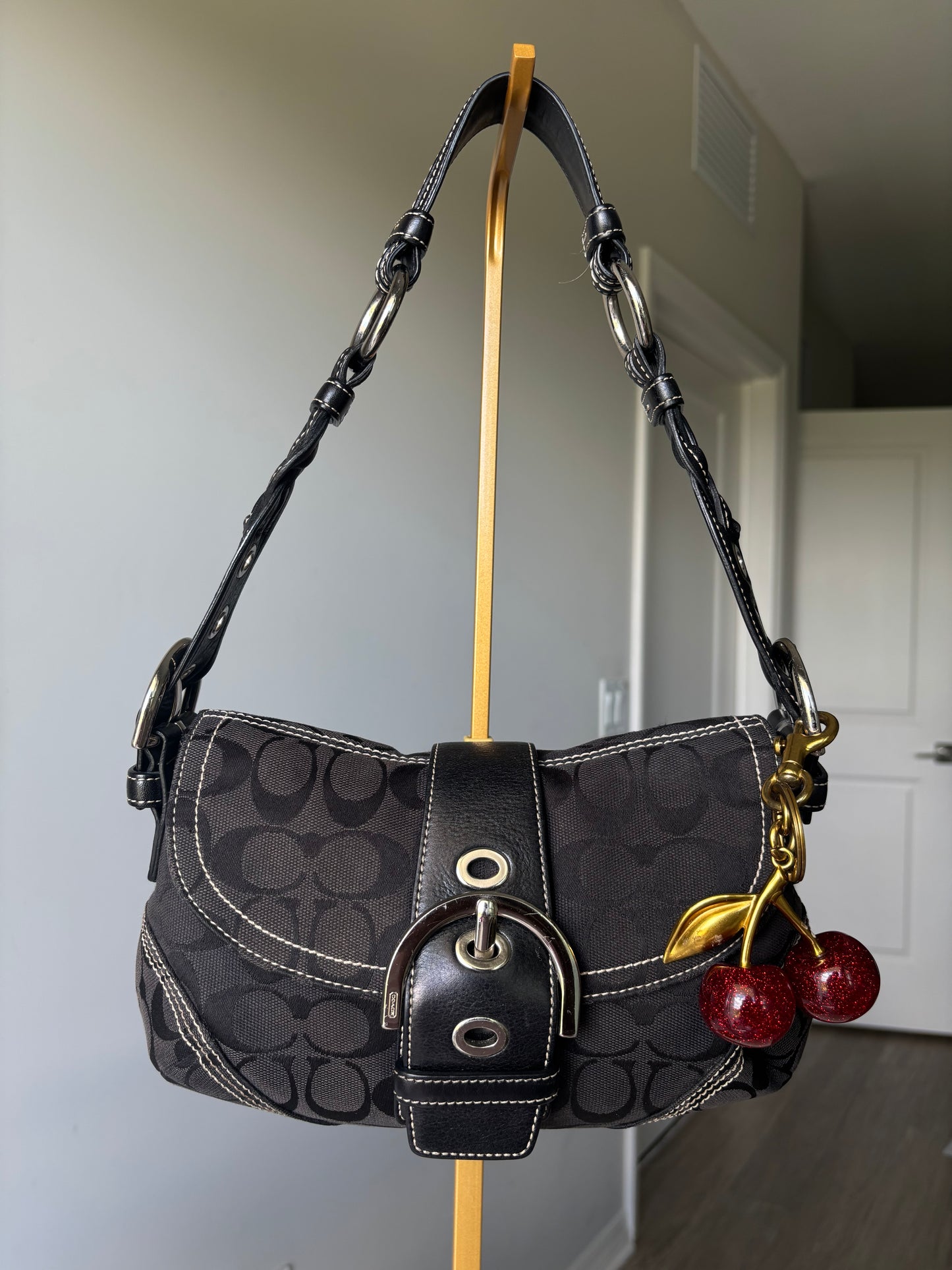 Black mongram coach soho