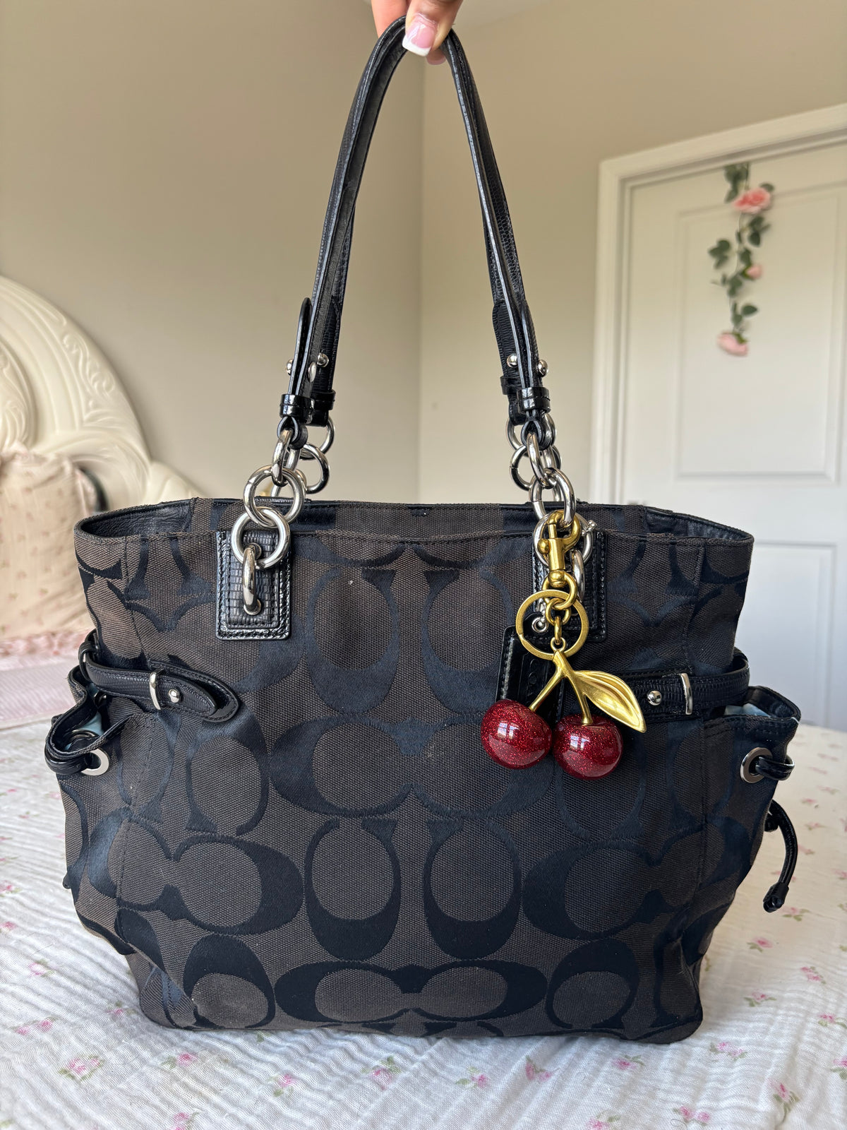 Black mongram coach tote bagfits