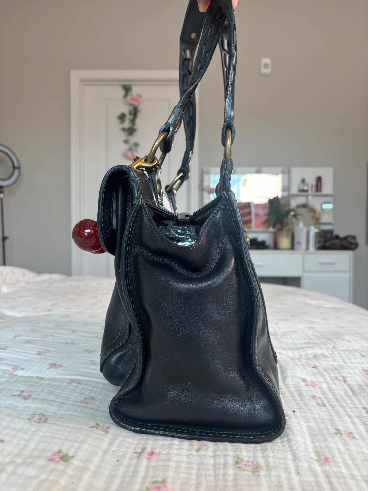 Black leather peacook coach tote bag