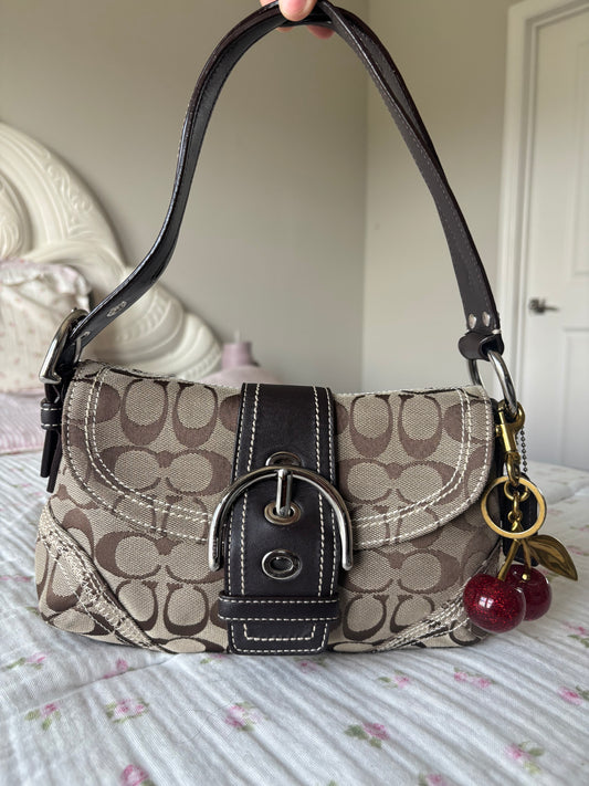 Rare brown mongram mini coach soho bag