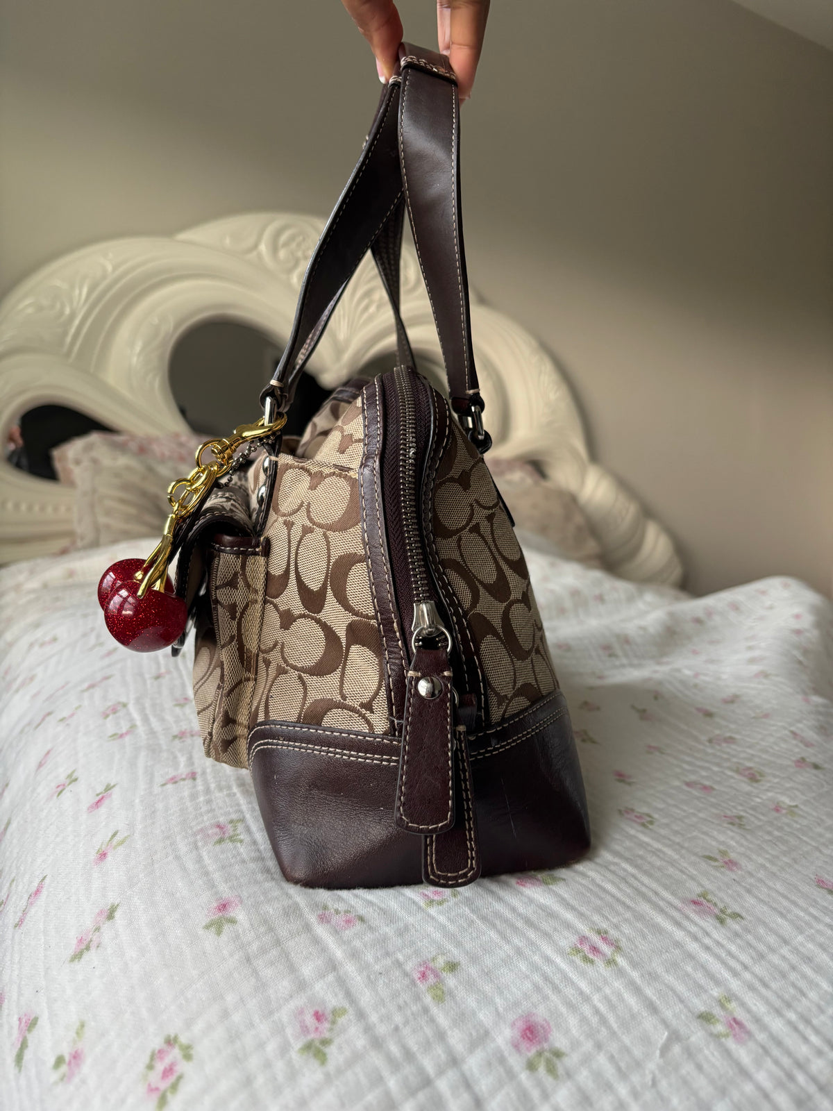 Brown mongram coach Hampton bag