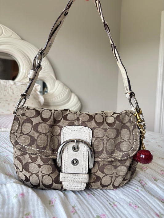 White mongram coach soho shoulder bag