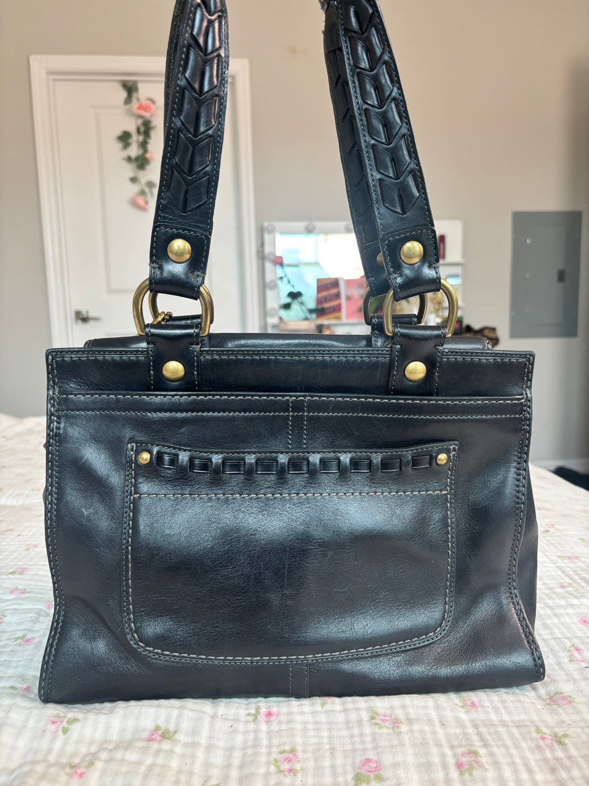 Black leather peacook coach tote bag