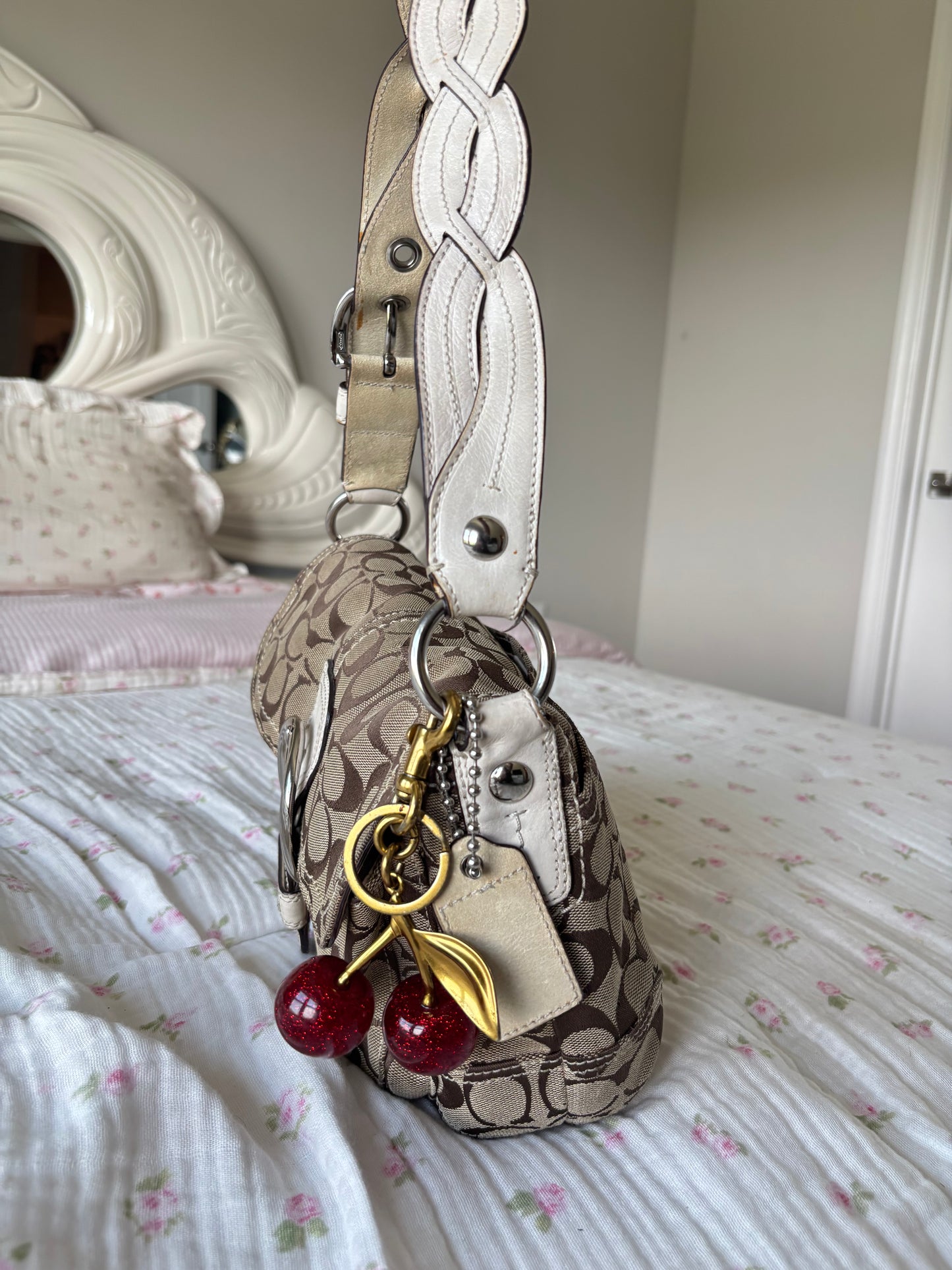 White mongram coach soho shoulder bag