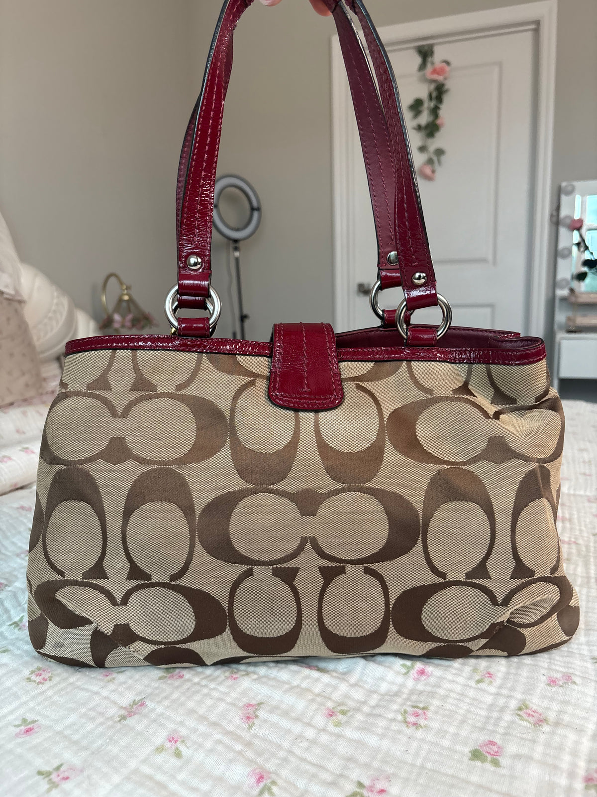 Red and brown mongram coach tote bag