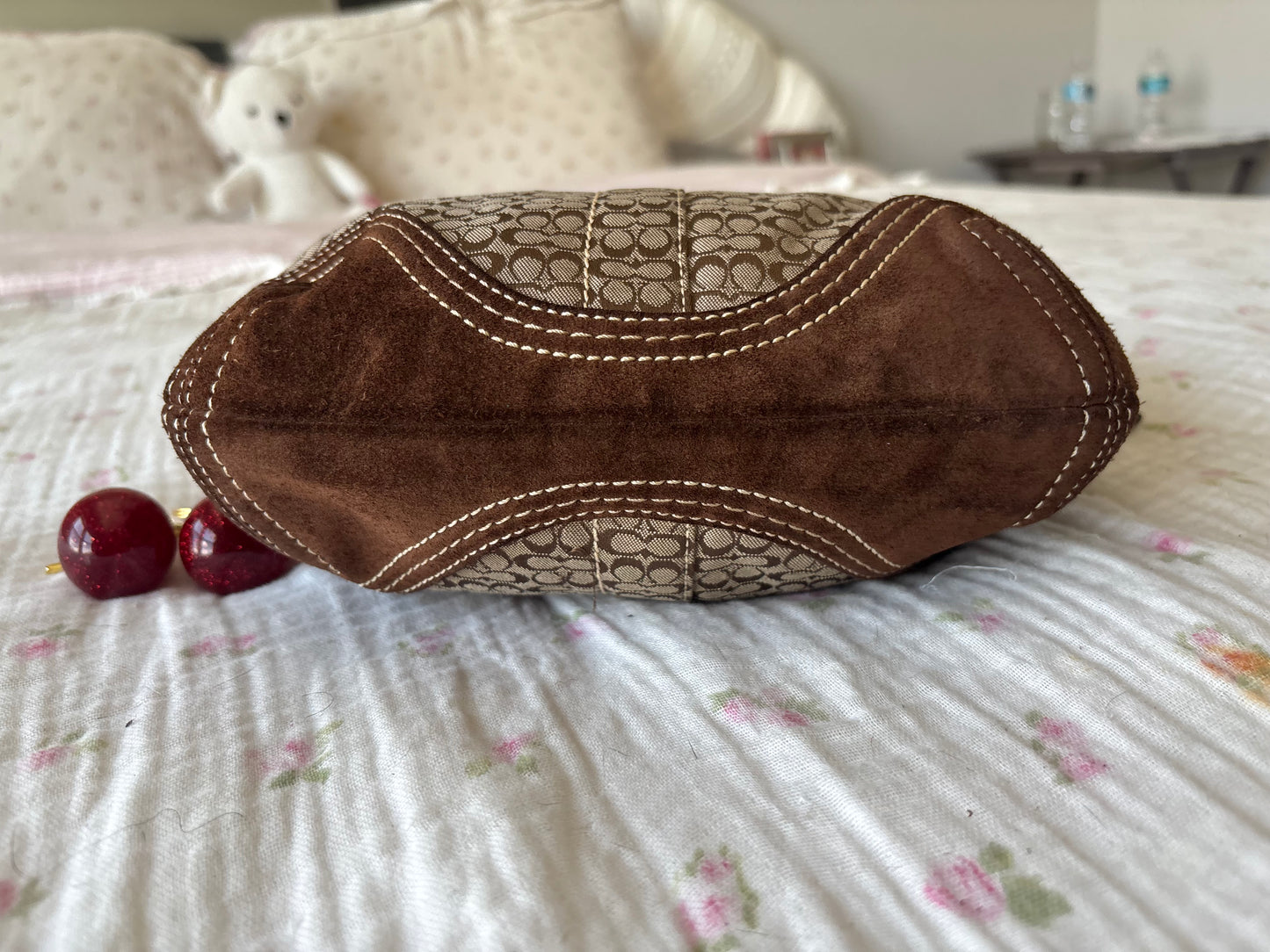 Brown mongram coach hobo bag