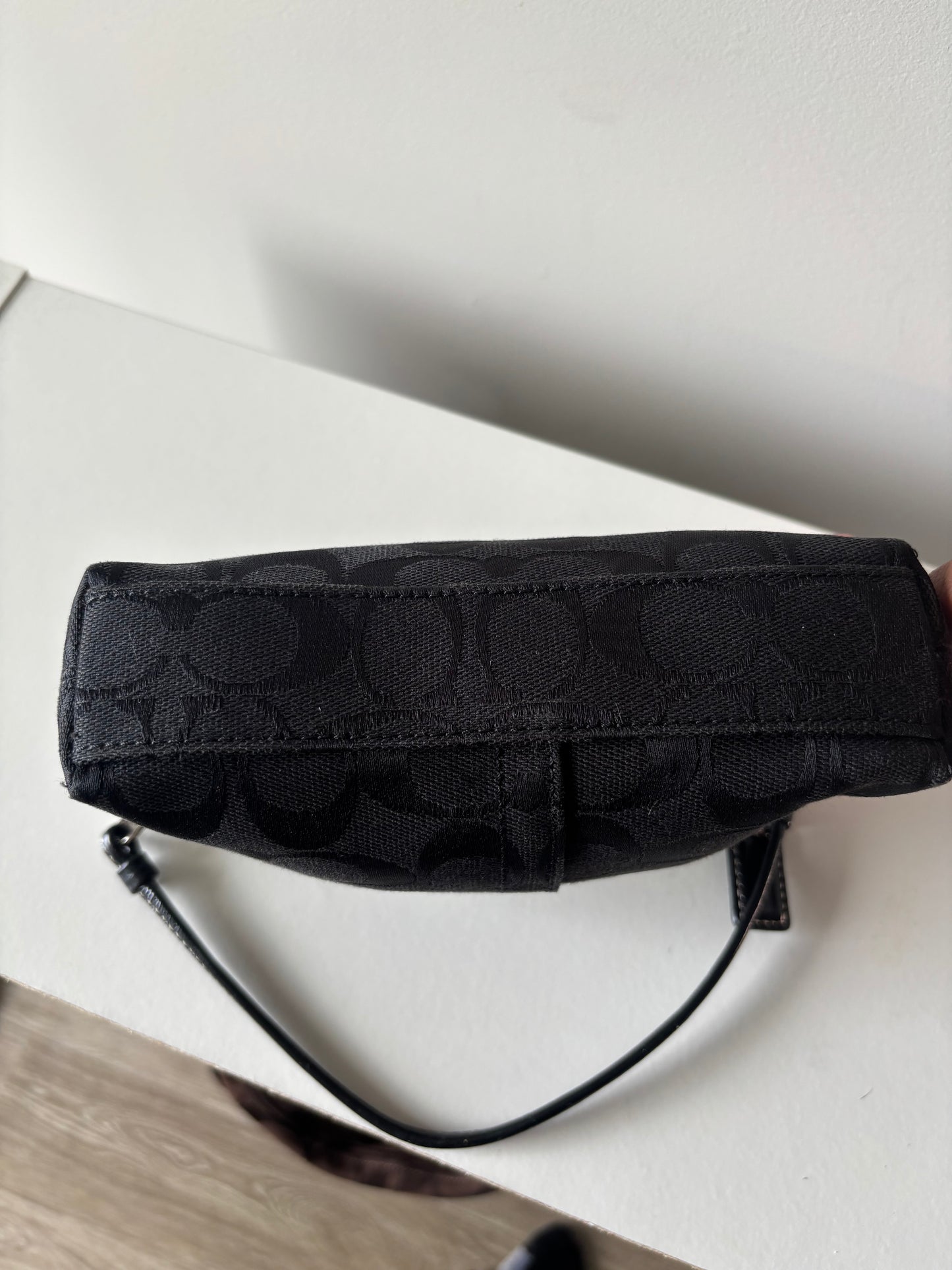 Black small coach handbag