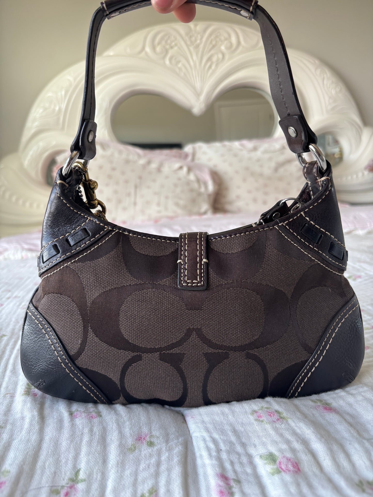 Brown mongram coach mini bag