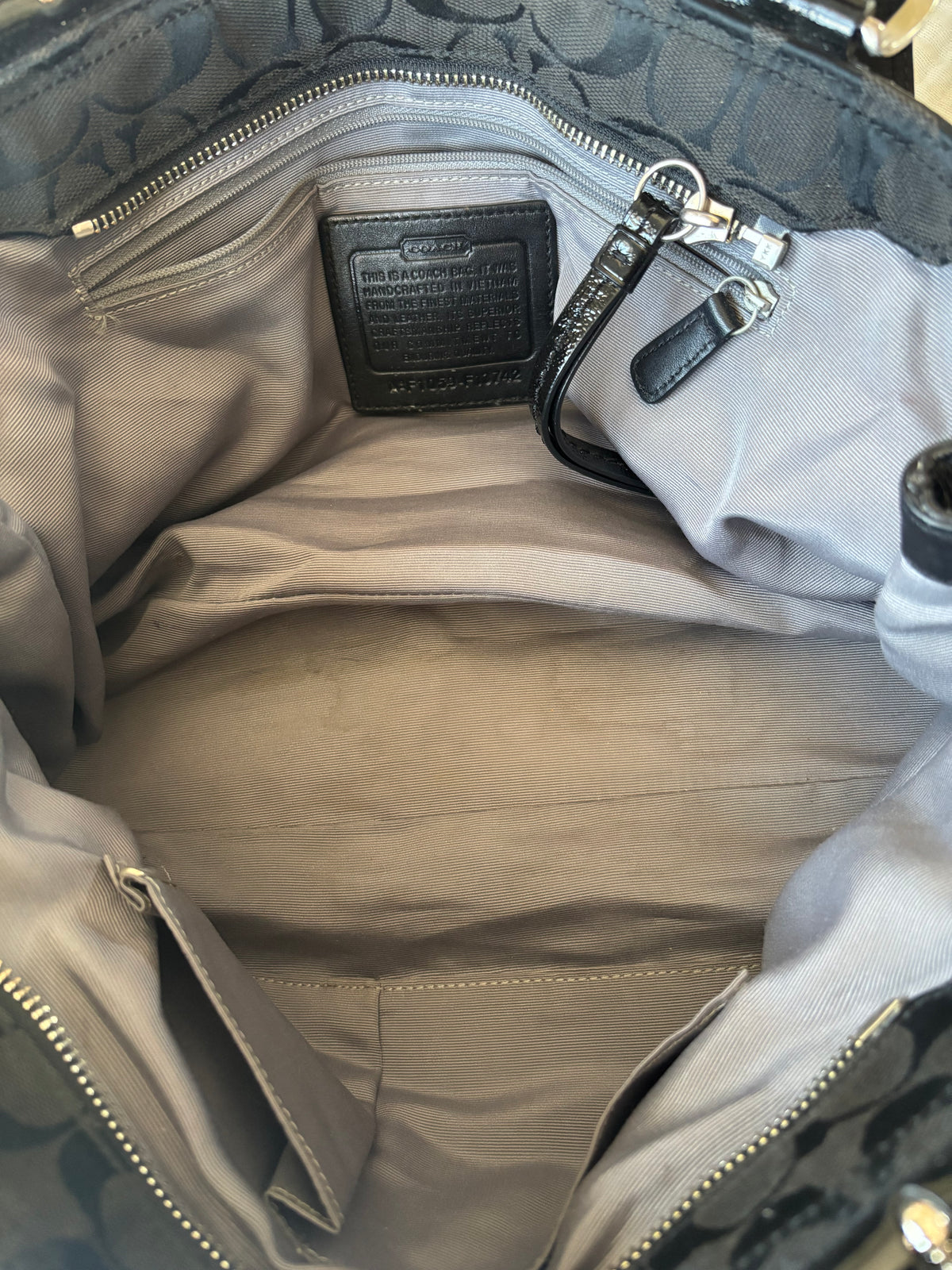 Black mongram coach bag
