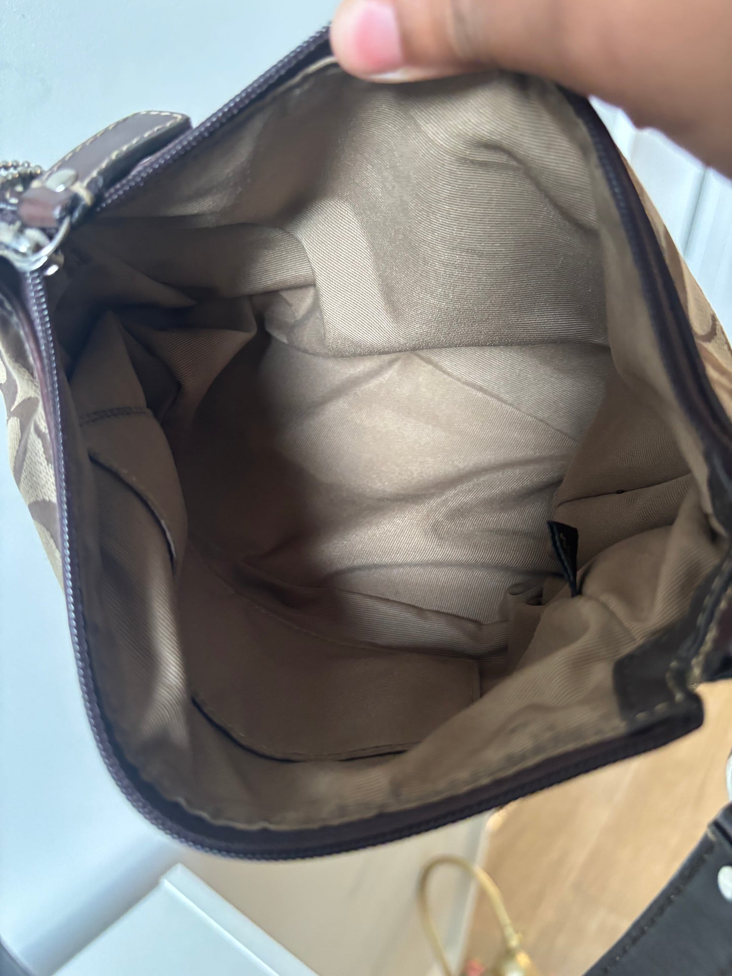 Brown coach baggutte shoulder bag