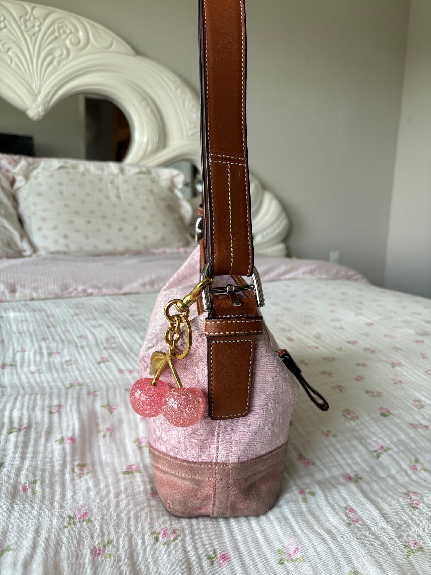 Pink mongram coach shoulder bag