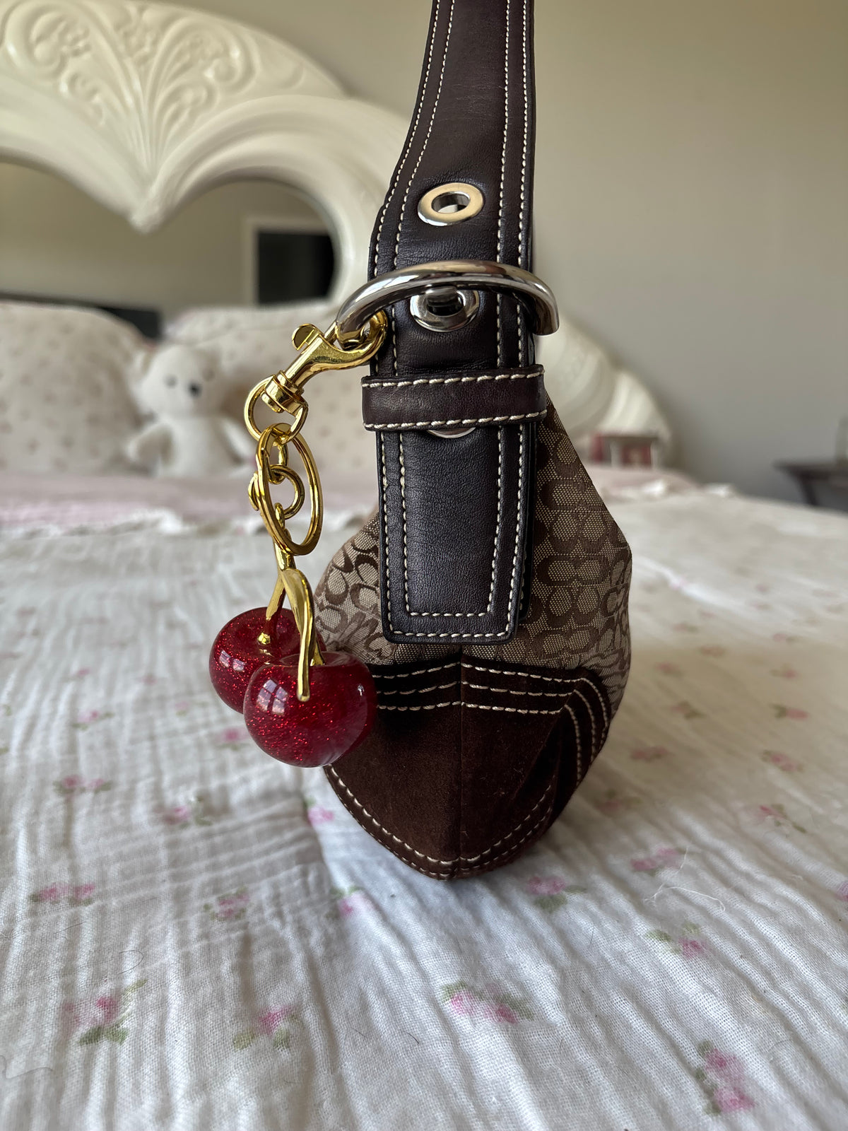 Brown mongram coach hobo bag