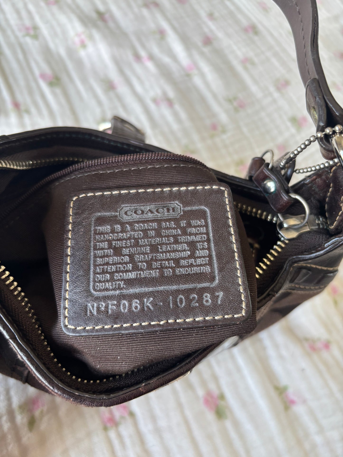 Brown mongram coach mini bag