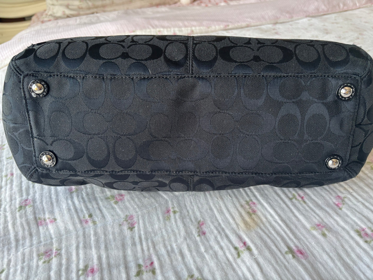 Black mongram coach bag