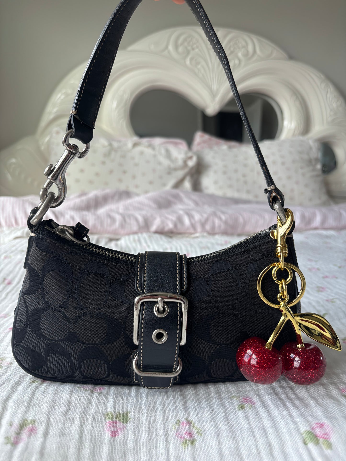 Black mongram coach Hampton soho