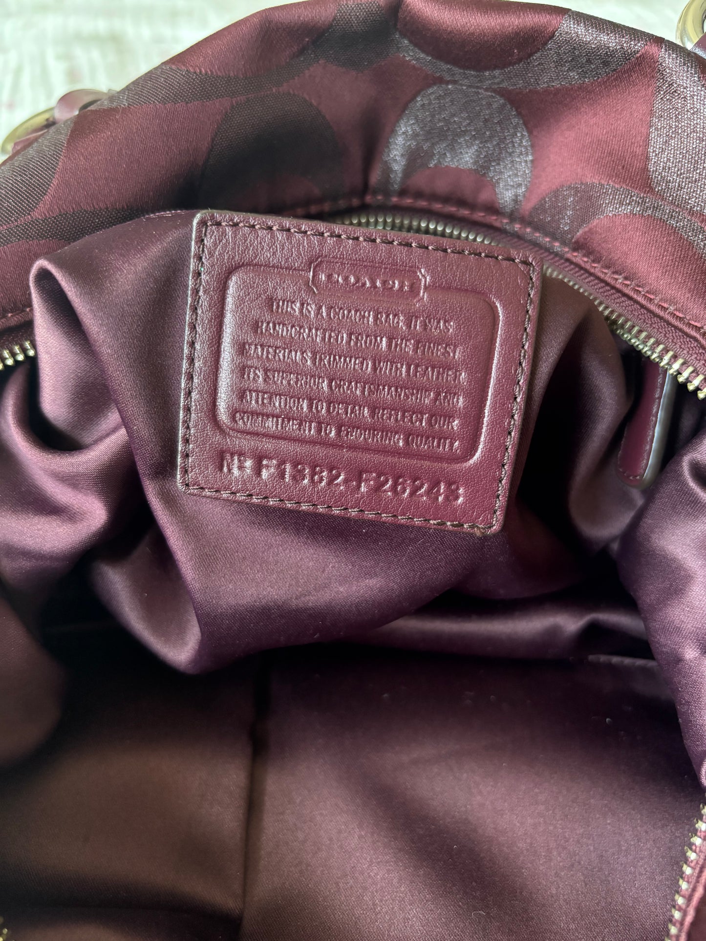 Burgandy rare coach mongram hand bag