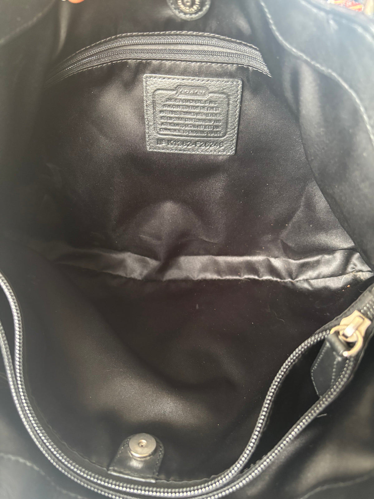 Black mongram coach tote bag
