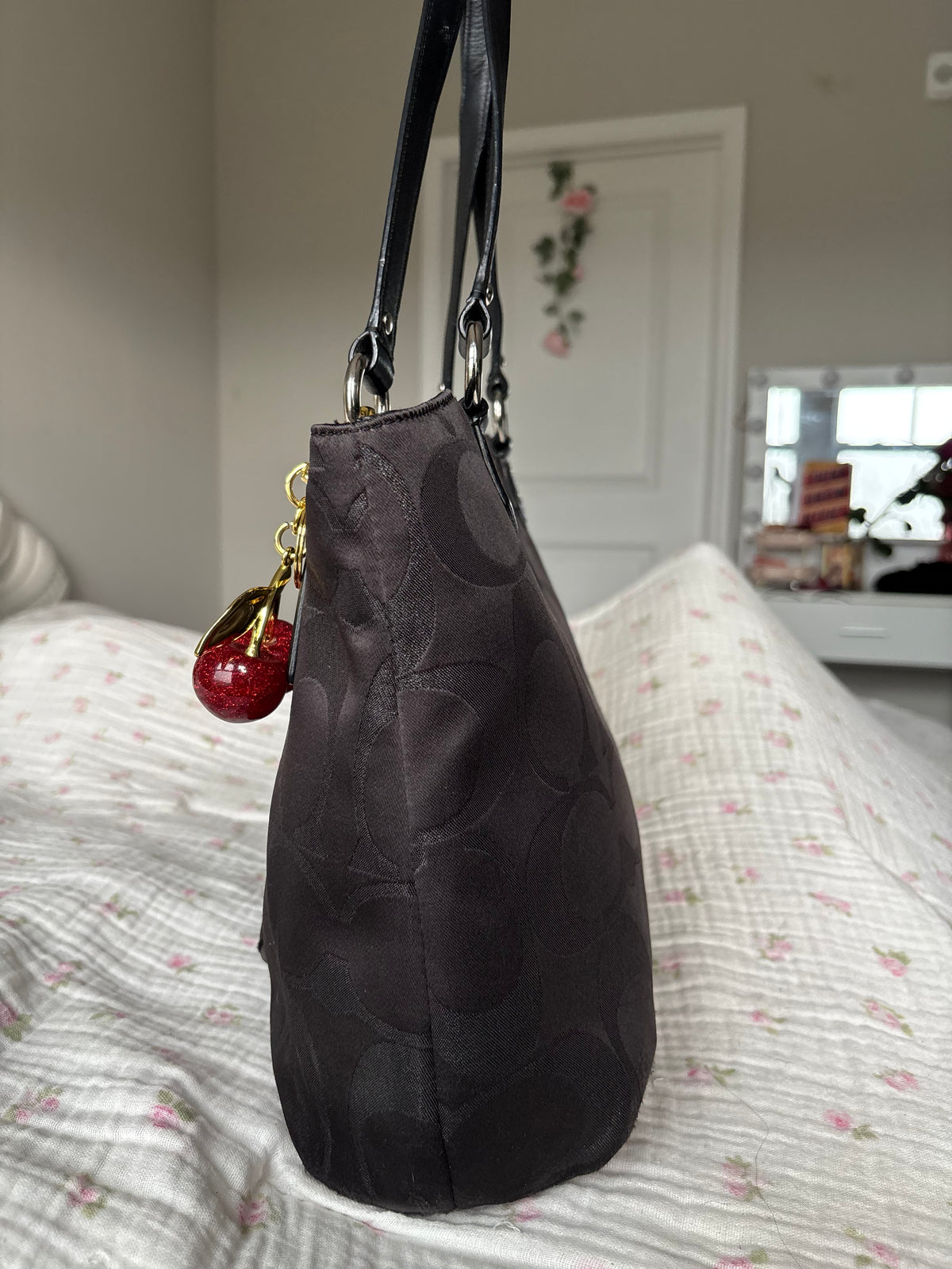 Black mongram coach tote bag