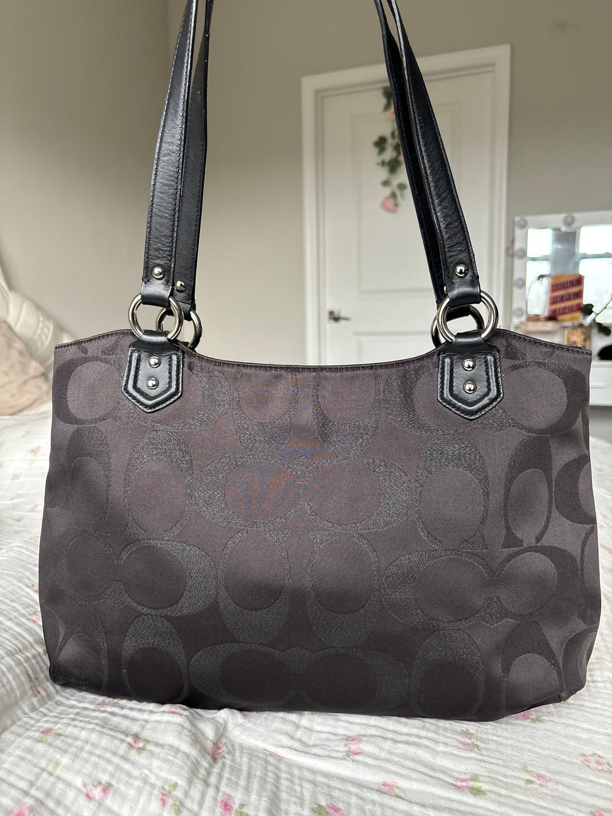 Black mongram coach tote bag