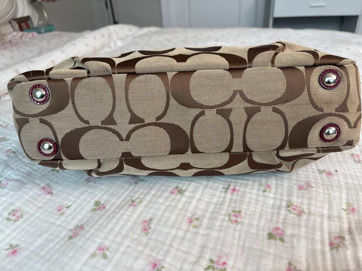 Red and brown mongram coach tote bag