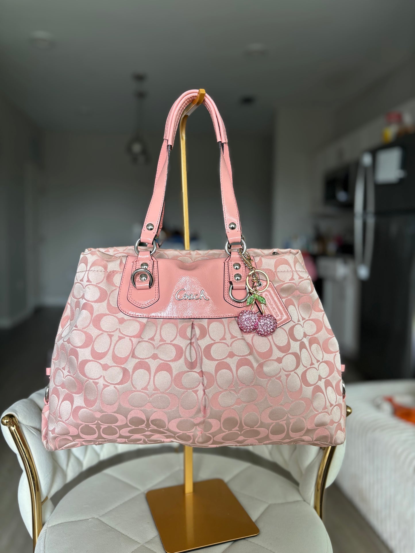 Pink mongram coach tote bag