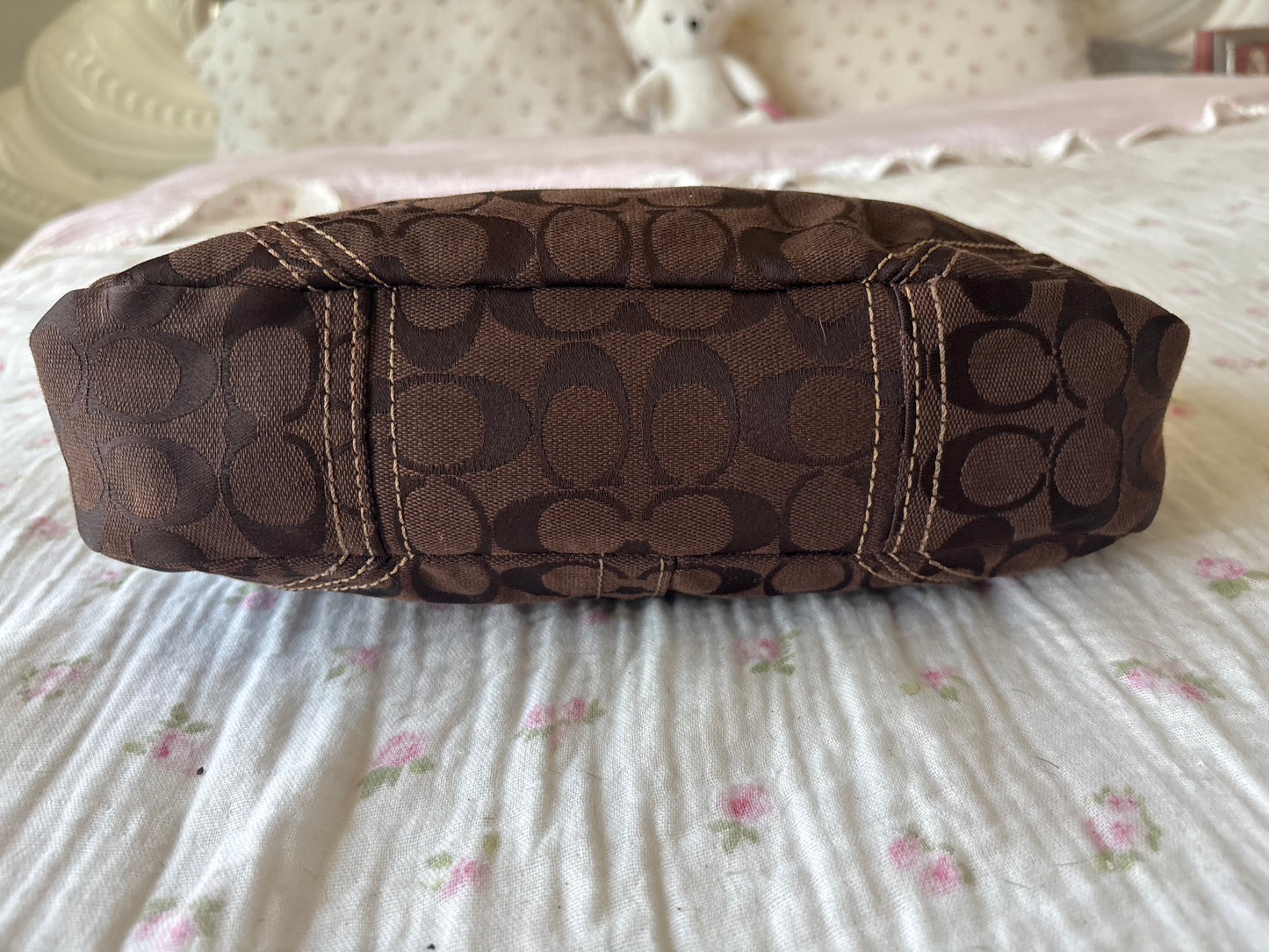 Brown mongram coach flap bag