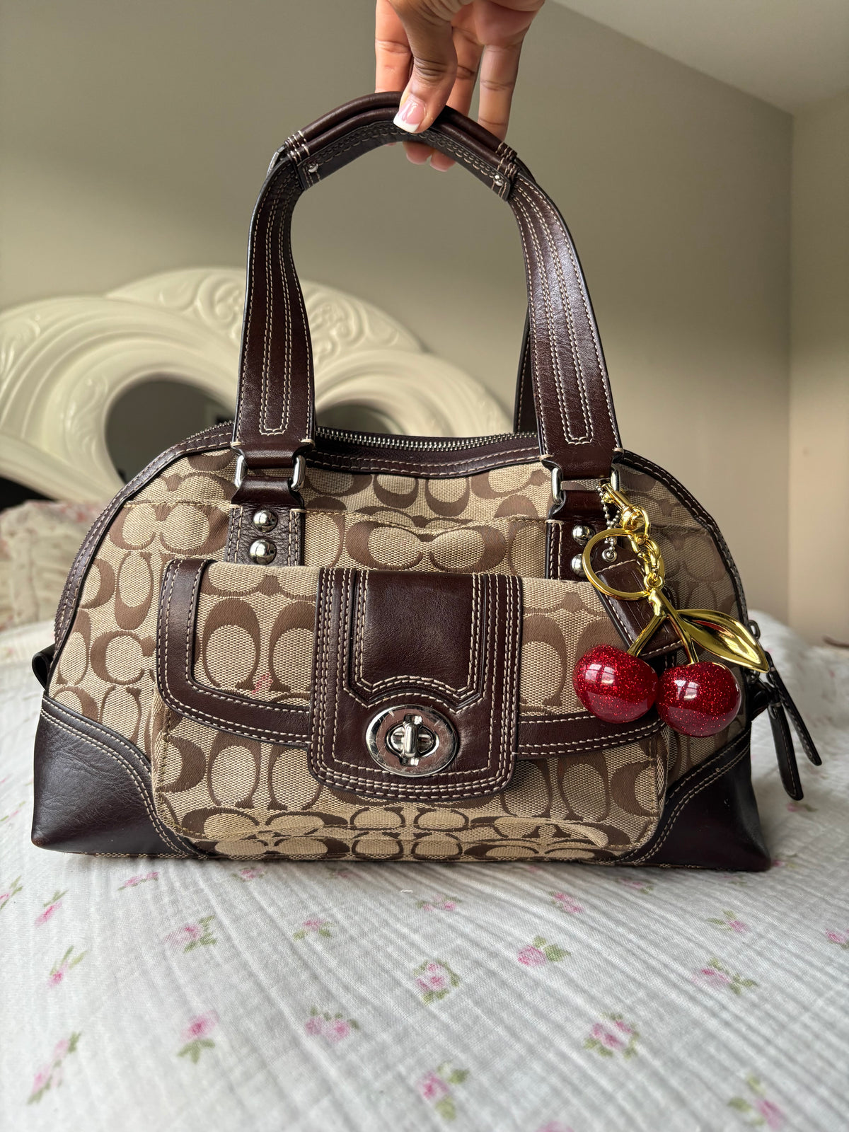 Brown mongram coach Hampton bag