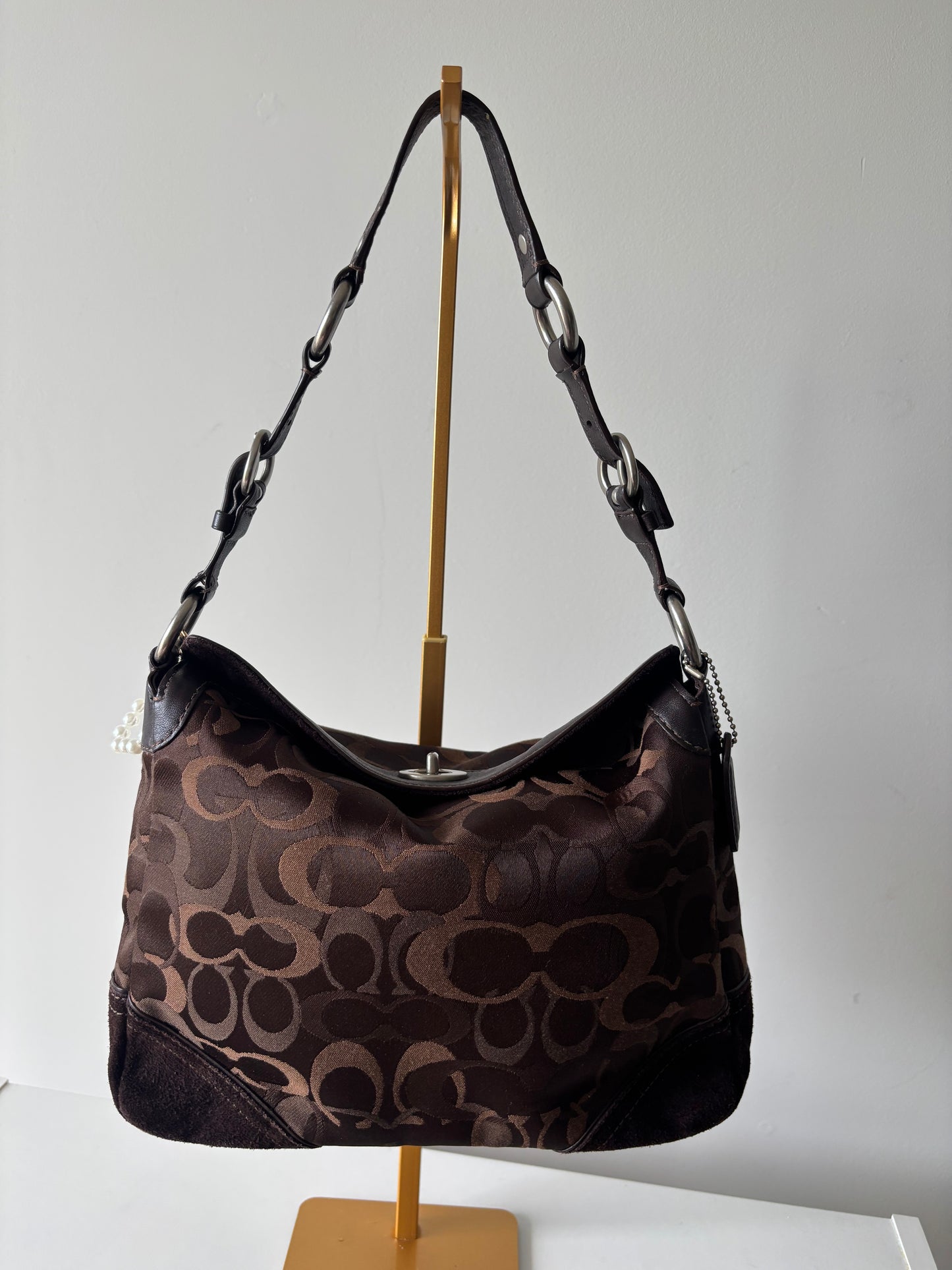 Brown optic coach shoulder bag